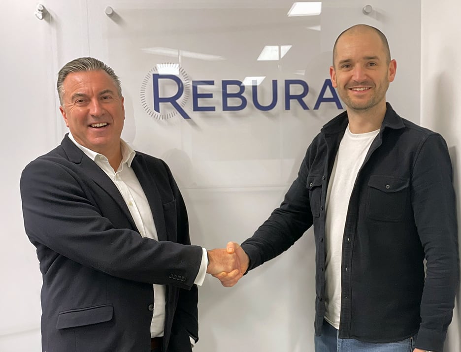 David Grant and Aaron Rees shaking hands in the Rebura headquarters
